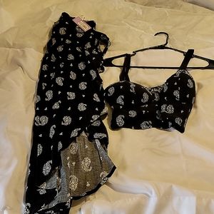 Two peice new with tags black and white top and long skirt with split tie up